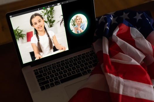 laptop with video chat, flag of the usa.