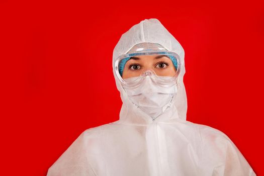 Doctor woman in a protective suit against coronavirus. Medical staff, preventive equipment. Doctor woman in a protective suit against coronavirus. Medical staff, preventive equipment