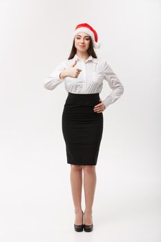 Business Concept - Modern caucasian business woman in the white studio background giving thumb up.