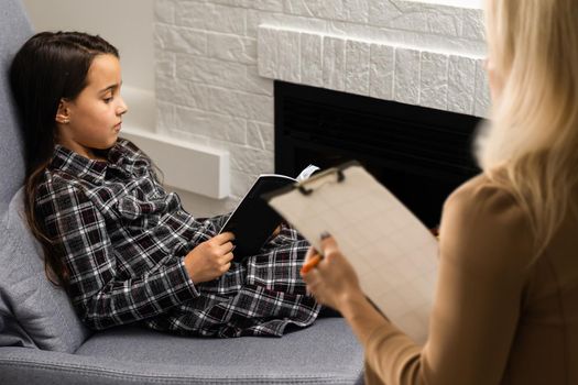 Cute little girl at child psychologist's office