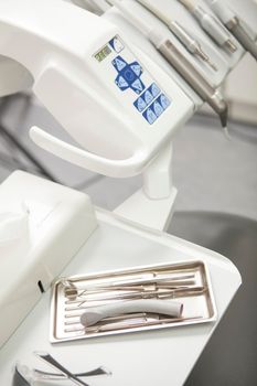 Vertical cropped shot of dental instruments at dentists office