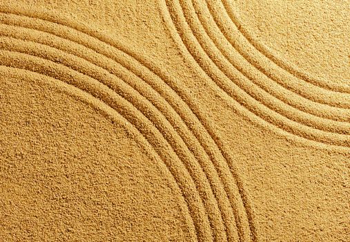Two arcs on yellow sand background summer beach warmth for harmony and balance of spirit.