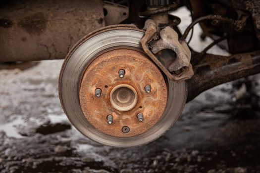 Old brake disc in the car.