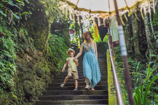 Mom and son tourists in Bali, Indonesia. Traveling with kids concept. What to do with children. Child friendly place.