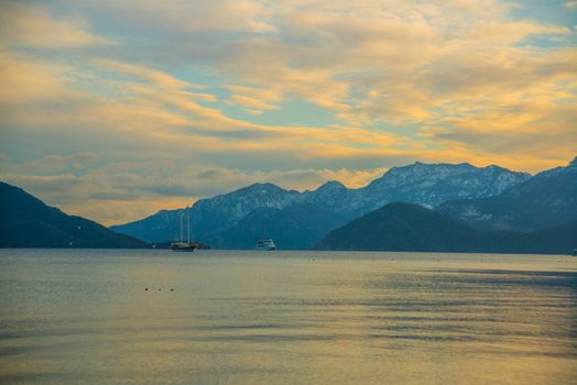 MARMARIS, MUGLA, TURKEY: View from Marmaris beach to the sea and mountains in the snow in winter.