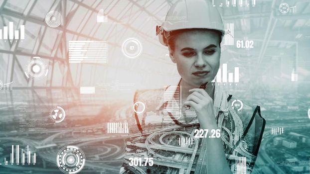 Future building construction and inventive engineering project concept with HUD hologram graphic design. Building engineer, architect people or construction worker works with modern civil technology.
