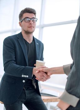 close up. business people greeting each other with a handshake