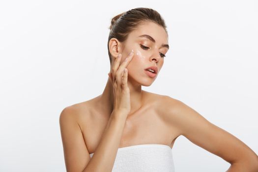 beauty girl of caucasian woman checks her skin, skin care, acne treatment.