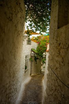 MARMARIS, MUGLA, TURKEY: Beautiful Streets of old Marmaris. Narrow streets with stairs among the houses with white brick, green plants and flowers in the old town of resort of in Turkey