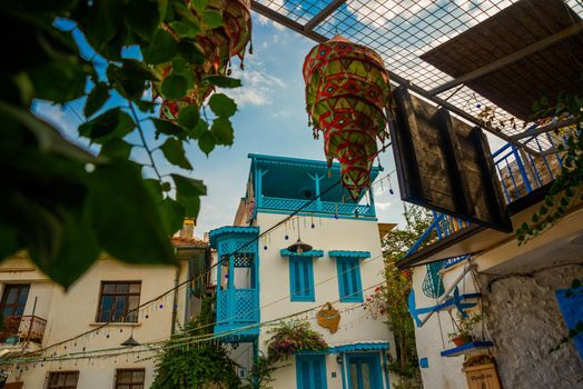 MARMARIS, MUGLA, TURKEY: Beautiful Streets of old Marmaris. Narrow streets with stairs among the houses with white brick, green plants and flowers in the old town of resort of in Turkey