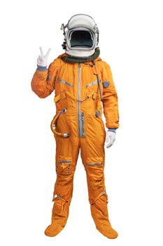 Astronaut wearing an orange spacesuit and helmet showing victory sign gesture isolated on white background. Unrecognizable cosmonaut with a hand showing victory sign isolated on white background.