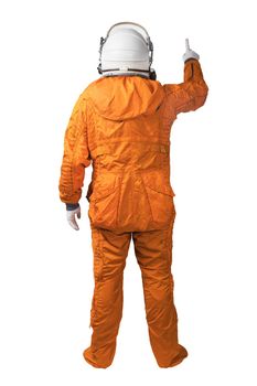 Astronaut wearing an orange spacesuit and space helmet touching something or hand gesture or isolated on white background. Rear view