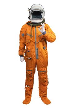 Astronaut wearing an orange spacesuit and helmet showing hand OK sign gesture isolated on white background. Unrecognizable cosmonaut with a hand OK sign isolated on white background.