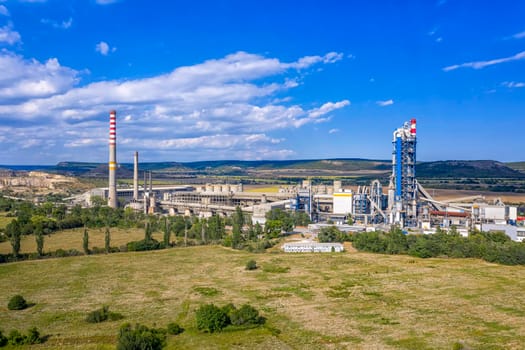 Aerial view from drone of cement factory.  Industrial landscape of cement factory.