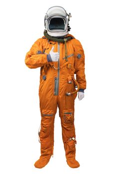 Astronaut wearing an orange spacesuit and helmet showing thumbs-up gesture isolated on white background. Cosmonaut with thumb up a hand against white background. Space for your copy