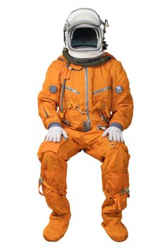 Astronaut wearing an orange spacesuit and open space helmet sitting isolated on white background. Unrecognizable cosmonaut isolated on white background