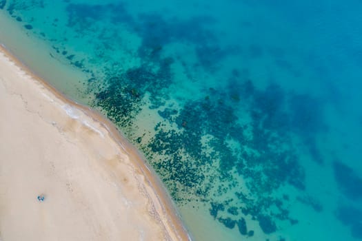 Top view aerial photo from flying drone of beautiful sea landscape with turquoise water with copy space for your advertising text message or promotional content. website background.