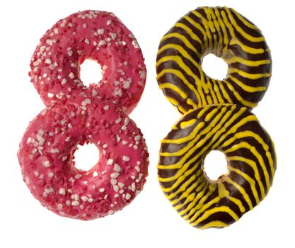Four appetizing American donuts, on white background isolated