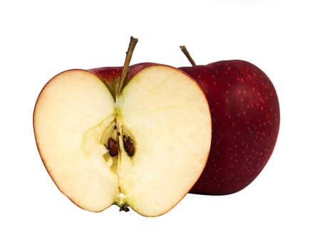 Ripe red apple and half apple on white background