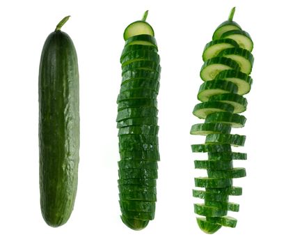 Fresh cucumber covered with chunks, on white background isolated