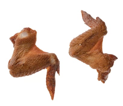 Smoked chicken wings on a white background in isolation