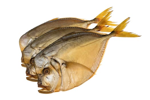 Three smoked vomer fish, on a white plate isolated