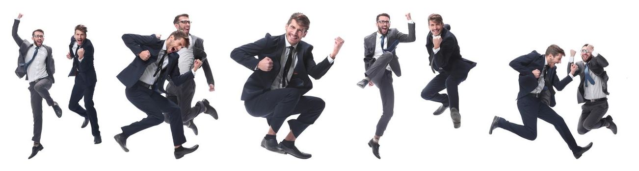 in full growth. two cheerful dancing business people. isolated on white background.