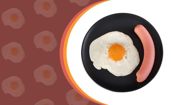 Fried egg and sausage on a black plate, on a white background, space for the text on a dark red background