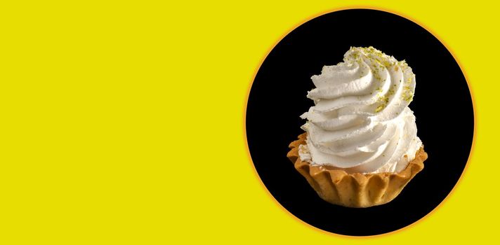cake with protein cream on a black background in isolation, place under the text on a yellow background