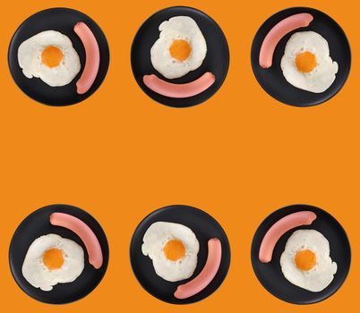 Fried egg and sausage on a black plate on an orange background place under the text