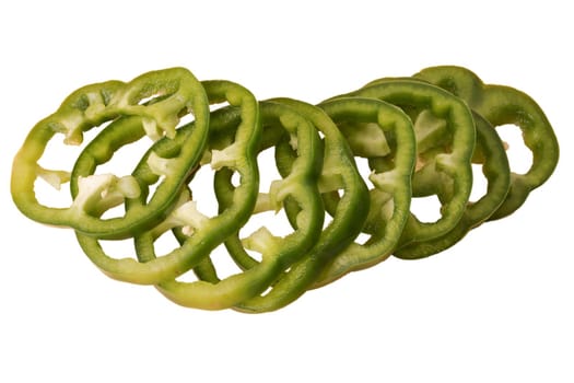 Green bell pepper sliced in pieces, slices on a white background in isolation
