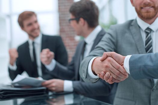 close up. business people shaking hands during a business meeting . business concept