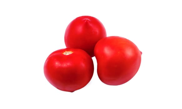 Three whole red tomatoes on a white background in isolation