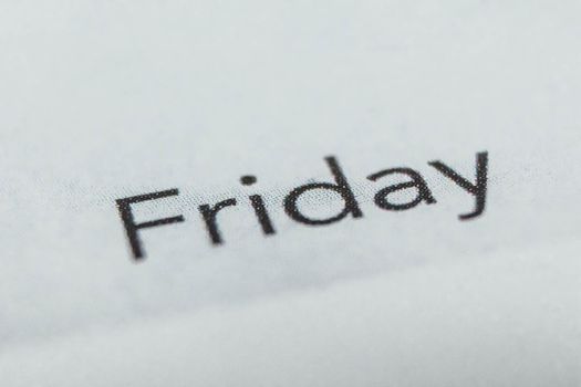 Friday, days of the week. Black and white macro shot of monthly planner - Image