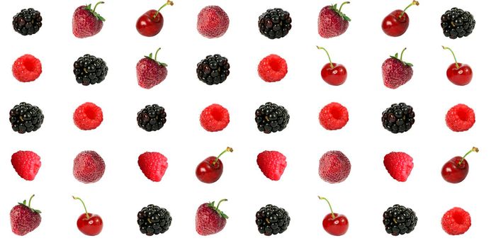 Assortment of ripe berries, lined up in rows, on a white background in isolation