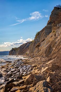 At a stone coastline at the Black sea. Vertical view.