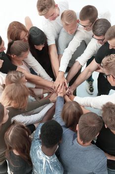 close up. a group of young people showing their unity