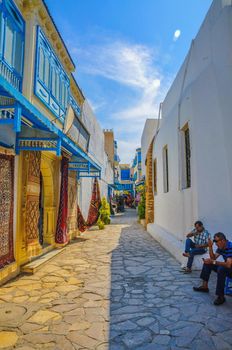 HAMMAMET, TUNISIA - Oct 2014: Stone ancient wall of Medina with bazaar on October 6, 2014 in Hammamet, Tunisia