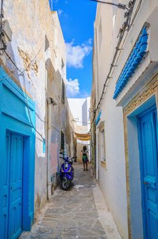 HAMMAMET, TUNISIA - Oct 2014: Narrow street of Medina on October 6, 2014 in Hammamet, Tunisia