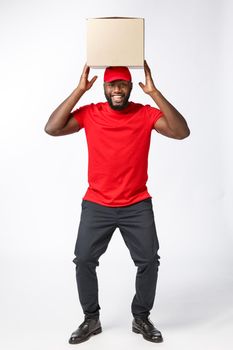 Happy African American man with a box on his head.