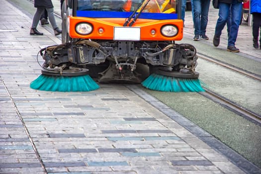 Sweeper truck, vehicle cleaning machine, clean urban road the streets in the city. Concept