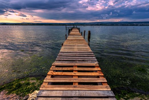 Exciting view from the shore with a wooden pier