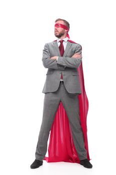 in full growth. confident businessman superhero looking at copy space . isolated on white