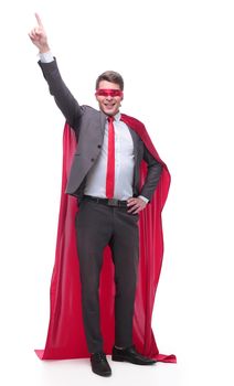 in full growth. superhero businessman pointing the right direction . isolated on white