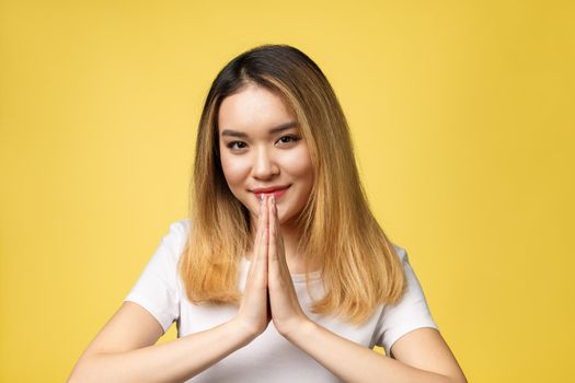 Tan Skin Female Model in white Shirt. Beauty Fashion Look style in yellow background in Studio Lighting,hello sawadee.