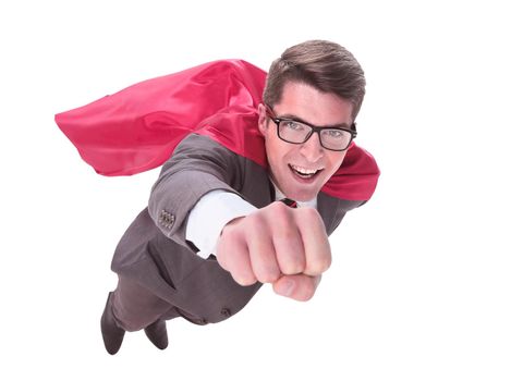 confident superhero businessman is flying to you . isolated on white