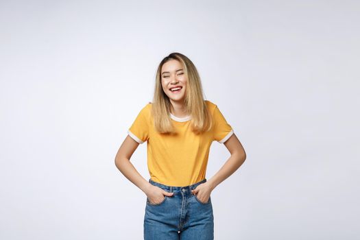 Young friendly Asian woman with smiley face isolated on white background