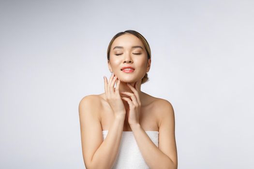 Portrait of beautiful asian woman makeup of cosmetic, girl hand touch cheek,face of beauty perfect with wellness isolated on white background.