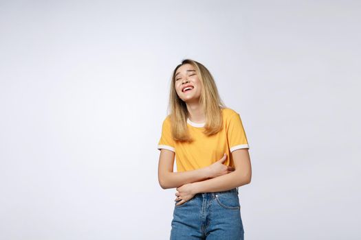 Young friendly Asian woman with smiley face isolated on white background