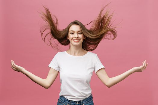 Portrait of crazy adorable young woman playing with her hairs. emotional girl isolated on white background.